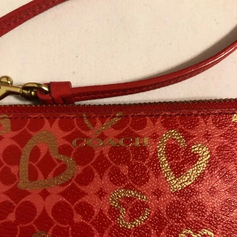 Coach heart wristlet